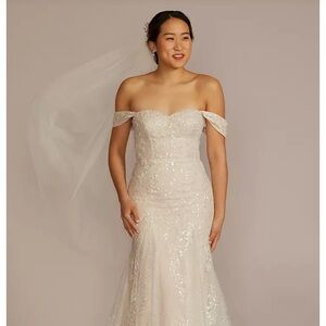 Mermaid style lace wedding dress.